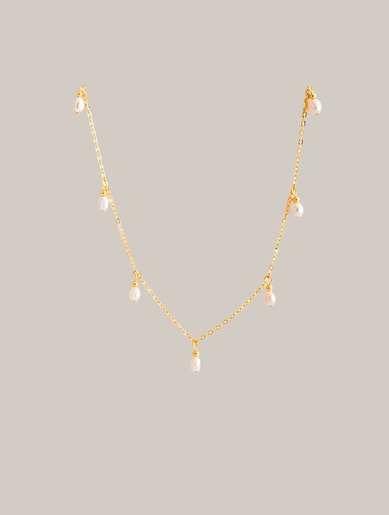 Collar de perlas colgates