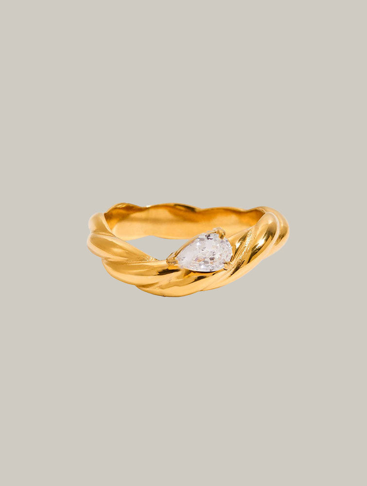 Anillo Trenzado con Diamante Central