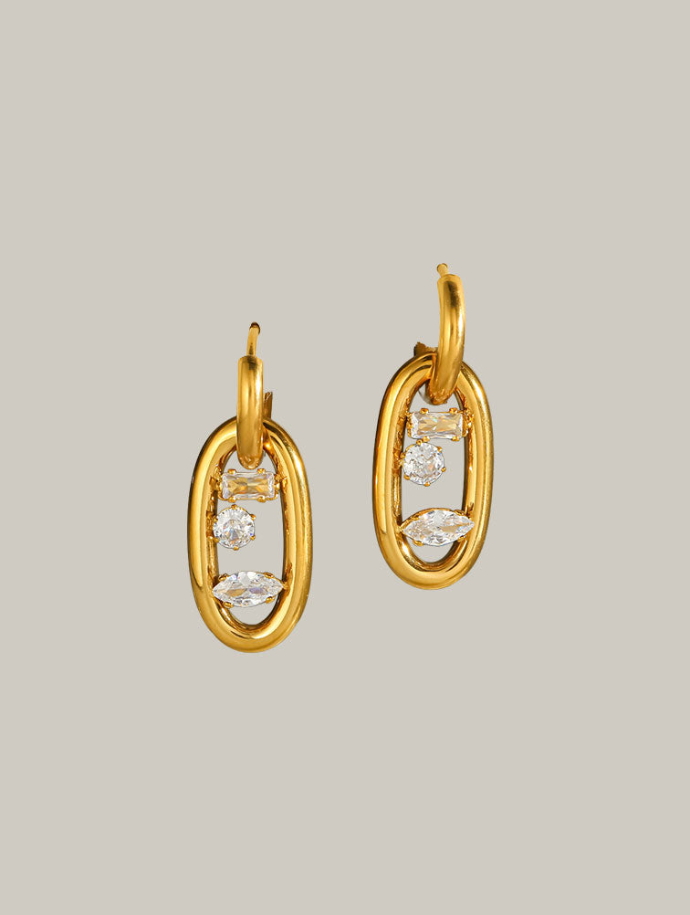 Aretes Eslabón Ovalado con Zirconias.